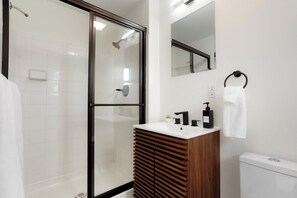 Shower, hair dryer, towels, soap