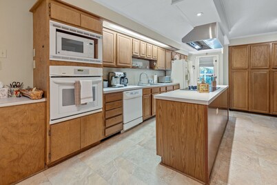 Lou Wilda House is a charming 3 bedroom home with a cozy back patio.