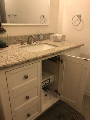 Hair dryer, towels, soap, shampoo