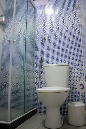 Hair dryer, towels, soap, shampoo