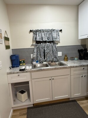 Fridge, microwave, coffee/tea maker, toaster