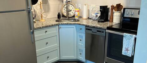 Microones, placa de cuina i rentaplats