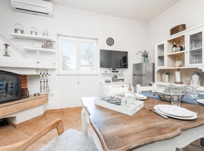 House (One Bedroom House with Terrace and Po) | Living room | 32-inch flat-screen TV with satellite channels - Holiday Home Pigmy Cormoran (Tisno)