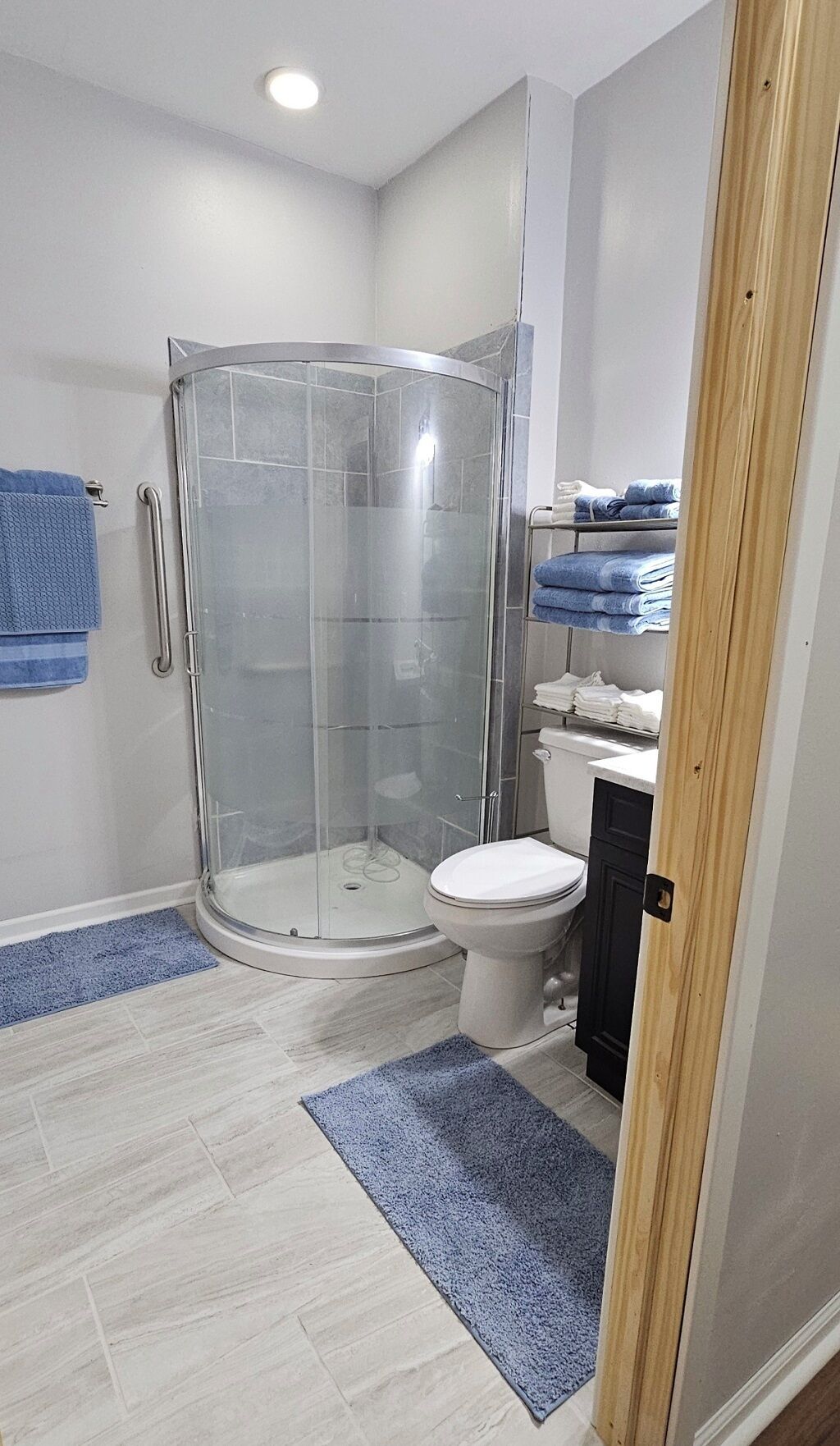 Shower, towels, soap, toilet paper