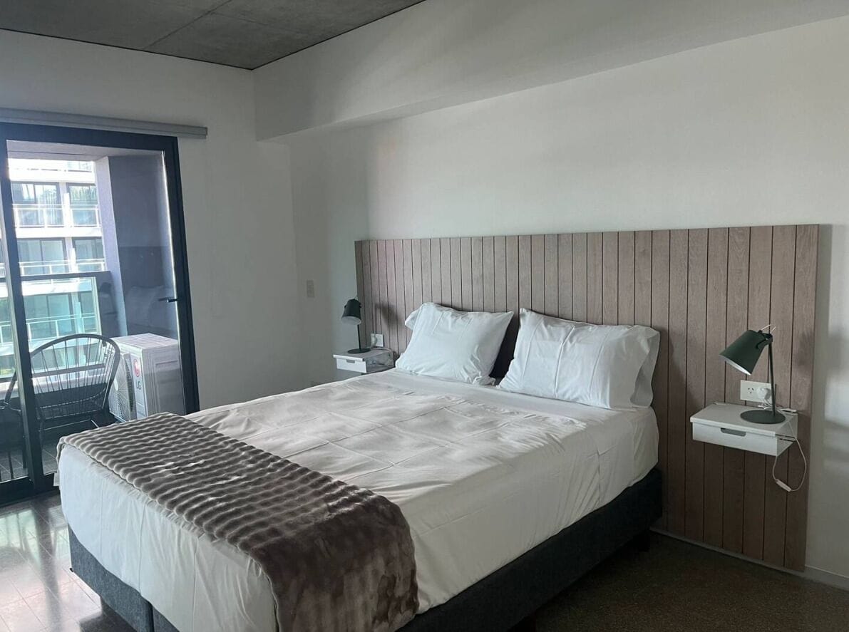 Standard Apartment 409 | In-room safe, desk, laptop workspace, blackout curtains