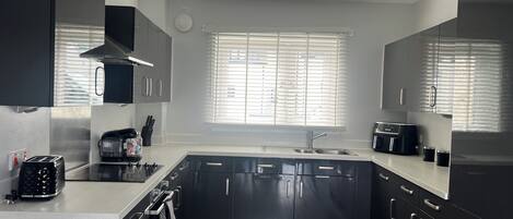 Fridge, microwave, oven, coffee/tea maker