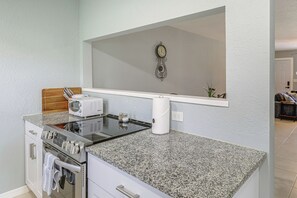 Fridge, microwave, stovetop, coffee/tea maker