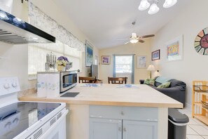 Fridge, microwave, stovetop, coffee/tea maker