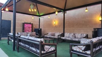 Chalet, 1 Bedroom | Living area | 32-inch flat-screen TV with satellite channels