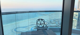 Beachfront 2BR Apartment with Stunning Sea View