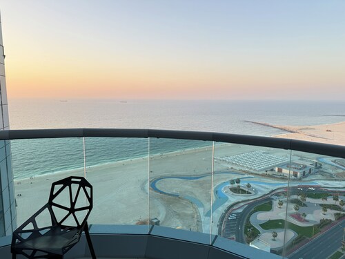 Beachfront 2BR Apartment with Stunning Sea View