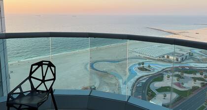 Beachfront 2BR Apartment with Stunning Sea View