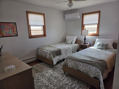 Family friendly, 1960's farmhouse on grain farm with AC in rural setting.