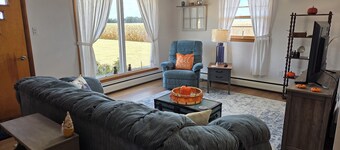 Family friendly, 1960's farmhouse on grain farm with AC in rural setting.