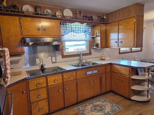 Family friendly, 1960's farmhouse on grain farm with AC in rural setting.