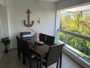 Outdoor dining - Peaceful 2-bedroom apartment with AC in Punta Cana, Oasis by the beach. (Punta Cana)
