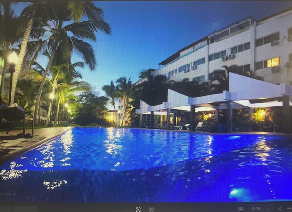 Outdoor pool, a heated pool - Peaceful 2-bedroom apartment with AC in Punta Cana, Oasis by the beach. (Punta Cana)