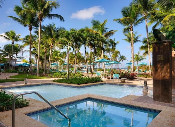 2 outdoor pools, cabanas (surcharge), pool umbrellas