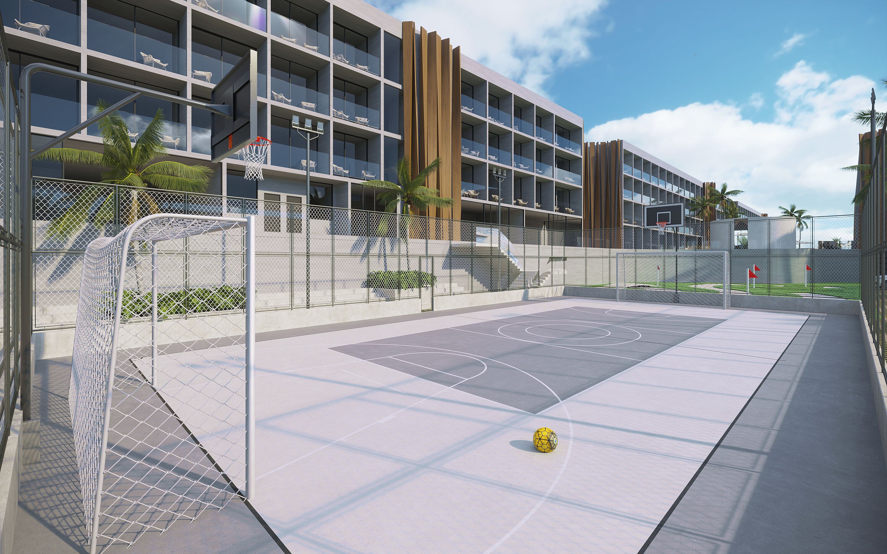 Een buitenbasketbalveld met een net, een basket en een voetbal.