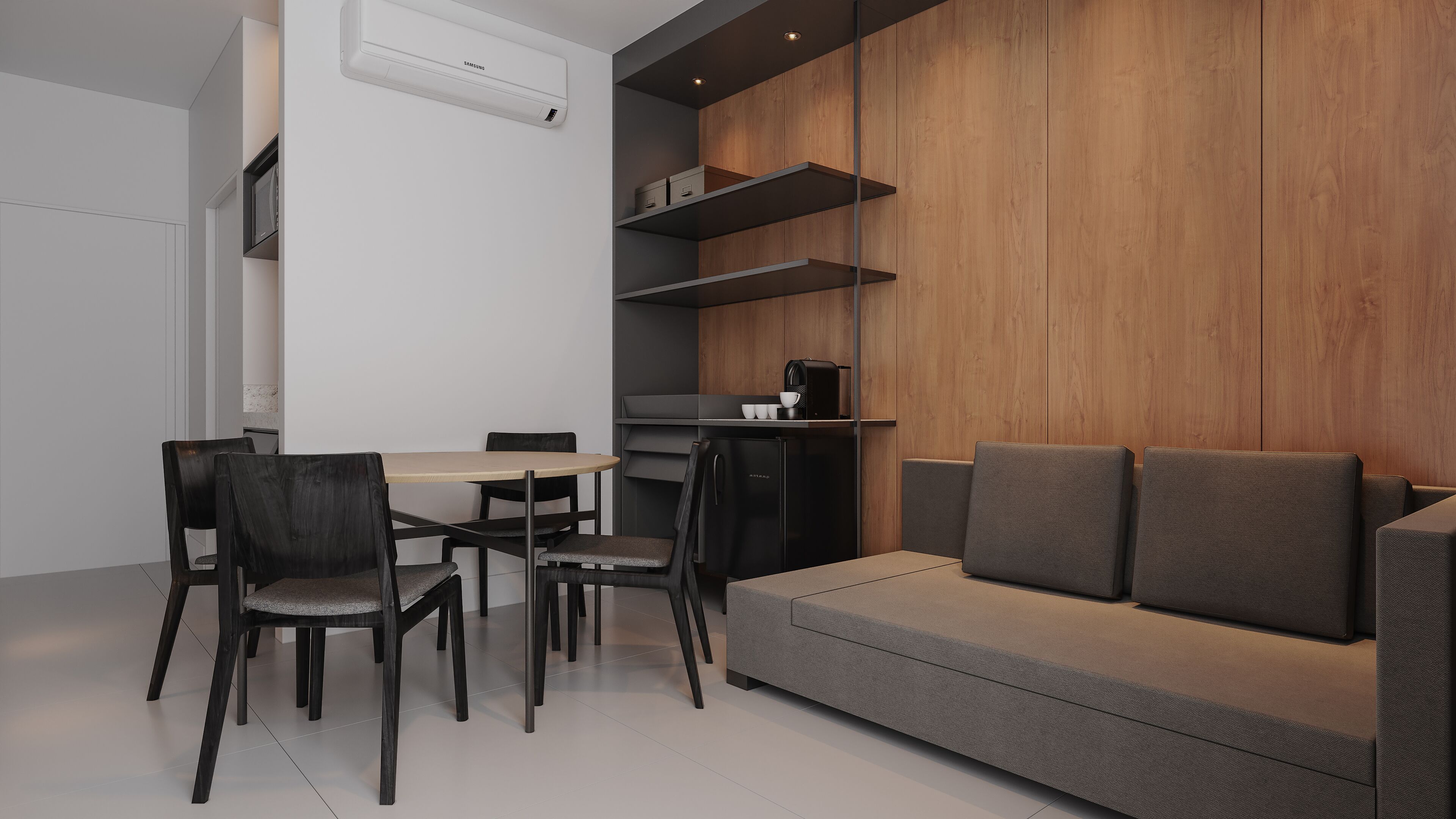 Un interior moderno con zona de comedor, sofá y estanterías empotradas.