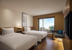 Roba de llit d'alta qualitat, minibar i caixa forta a l'habitació 