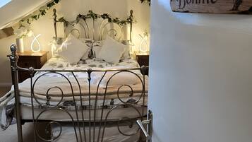 Iron/ironing board, travel crib, free WiFi, bed sheets