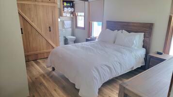 2 chambres, coffre-fort, fer et planche à repasser