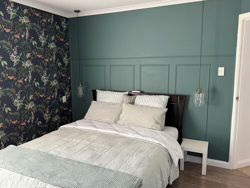 Tranquil 2 bedroom home featur an open-plan living area and outdoor courtyard.