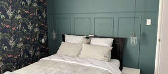 Tranquil 2 bedroom home featur an open-plan living area and outdoor courtyard.