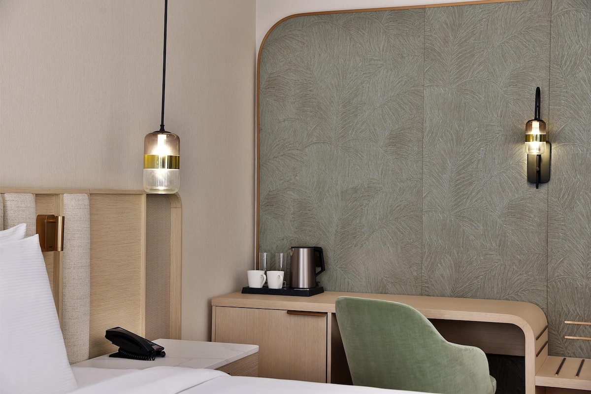 Premium bedding, down comforters, Select Comfort beds, minibar