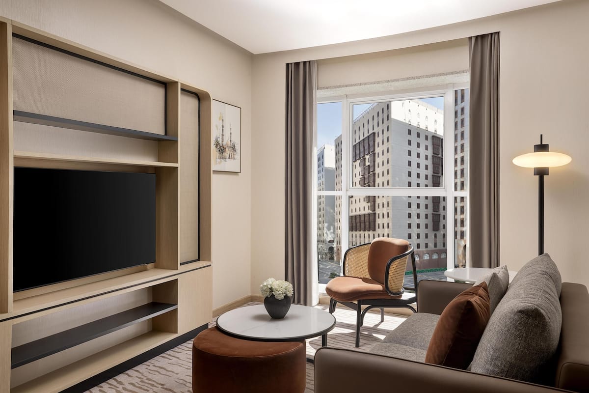 Junior Suite, 1 King Bed (Palm) | Living area | 48-inch Smart TV with digital channels