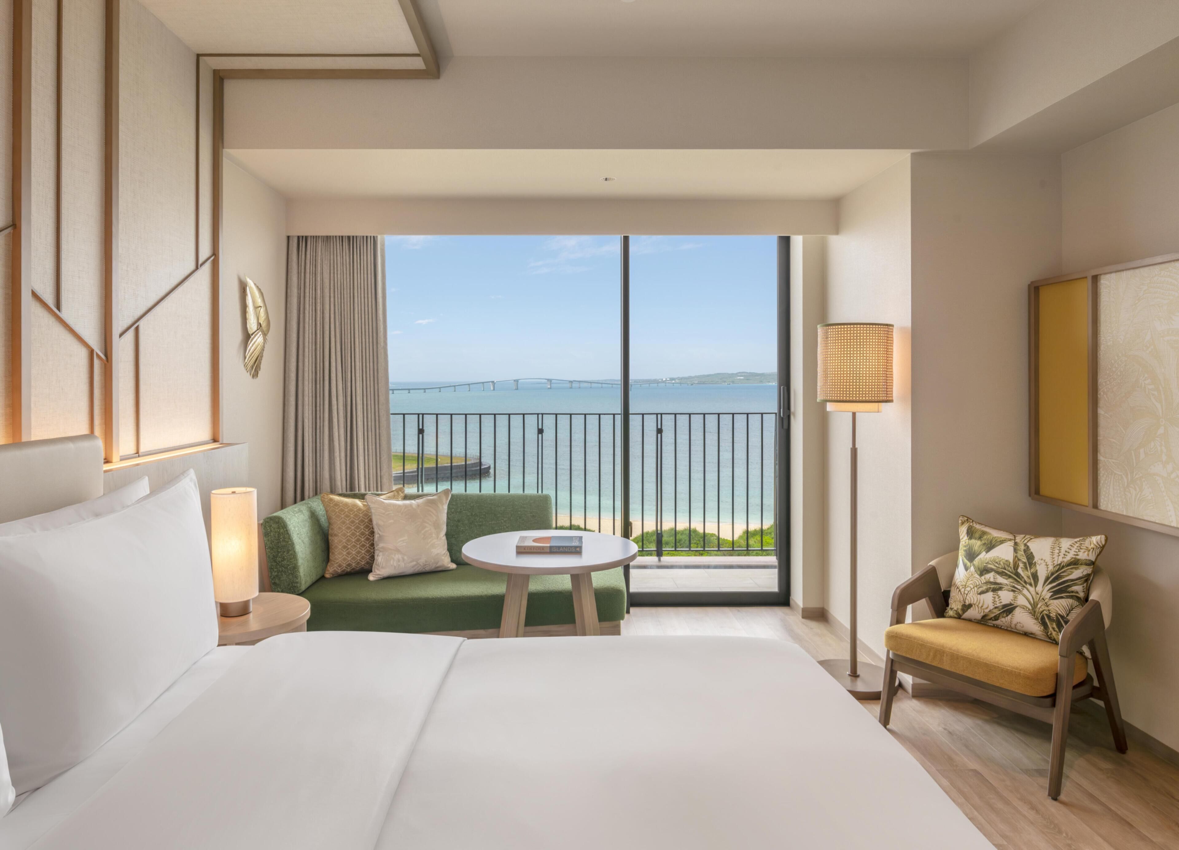 KING DELUXE ROOM OCEAN VIEW | Living area | 55-inch flat-screen TV with satellite channels