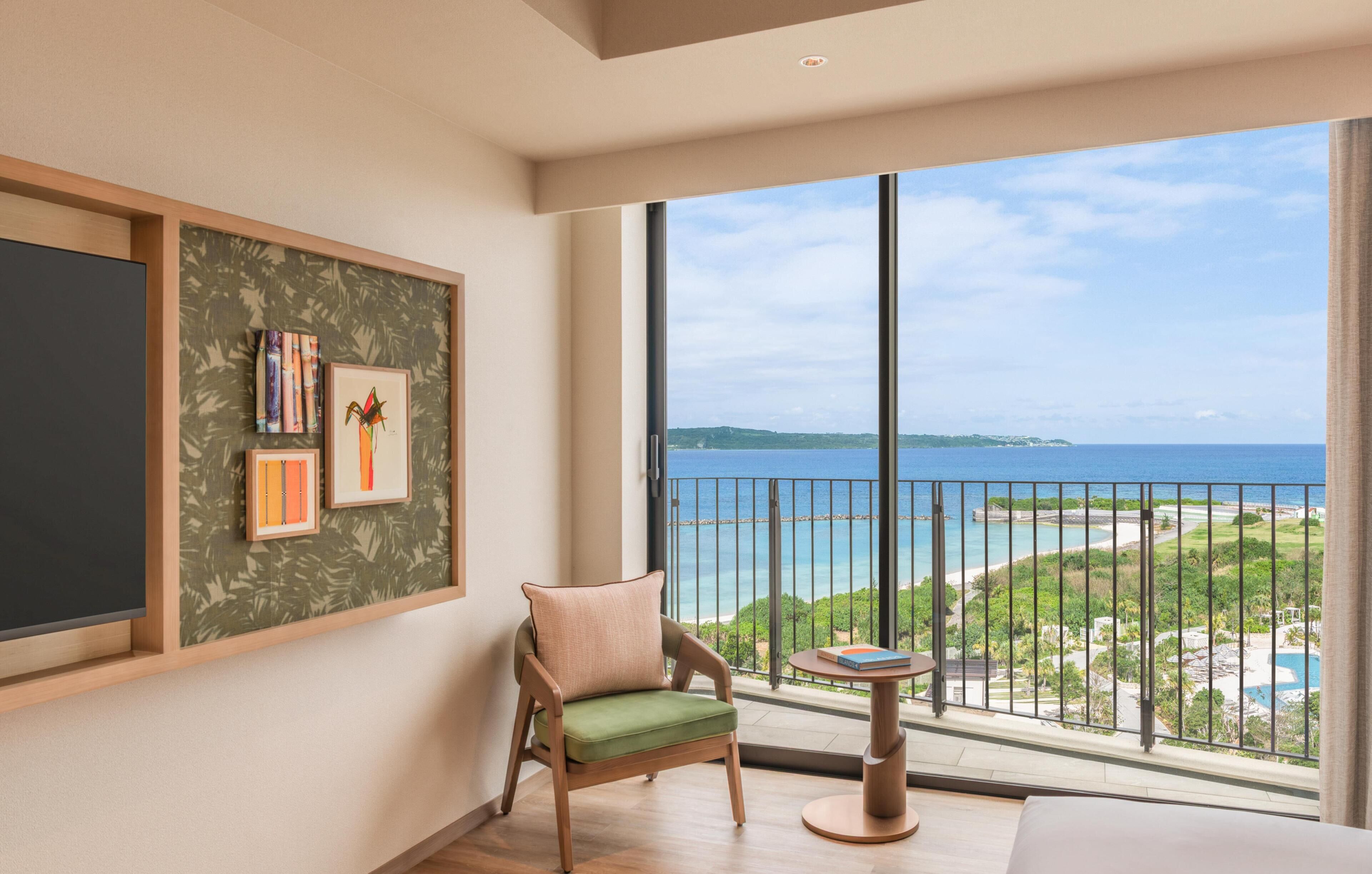 Suite Premium, 1 très grand lit | Coin séjour | Télévision à écran plat de 55 pouces avec chaînes par satellite