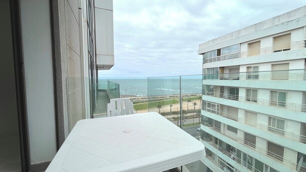 A balcony with a view of the beach and ocean. - Modern sea view, near Hassan II Mosque, close to town center (Casablanca)