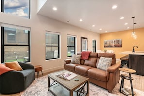TV, fireplace - Basecamp Stays: Vibrant & Chic Pad, Hot Tub, & AC! (Driggs)