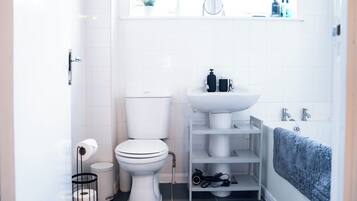 Hair dryer, soap, shampoo, toilet paper