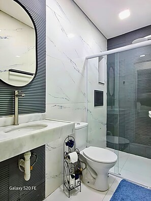 Shower, hair dryer, towels, soap