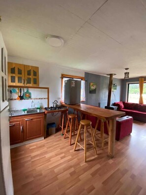 Family Cabin, Patio, Hill View | Private kitchen