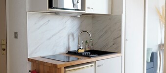 Renovated T2 apartment in the heart of Paray with view of the Basilica bell tower - Parking