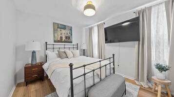 2 bedrooms, desk, iron/ironing board, travel crib