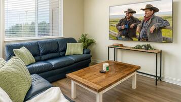 Departamento clásico, 1 cama Queen size, para no fumadores, se aceptan mascotas | Área de sala de estar