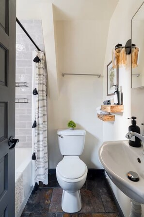 Hair dryer, towels, soap, toilet paper