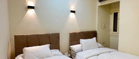 2 chambres, fer et planche à repasser, Wi-Fi gratuit, draps fournis