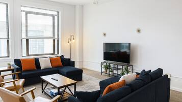 TV, fireplace, books