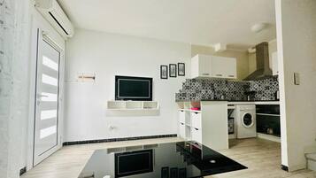 Microwave, coffee/tea maker, cookware/dishes/utensils