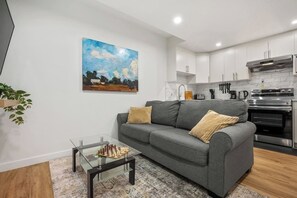 TV, books, offices - Modern 2BR Private Suite Near Calgary Airport (Calgary)