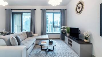 Deluxe Apartment, 1 Bedroom, Balcony, City View | Living room | 43-inch flat-screen TV with satellite channels, Netflix