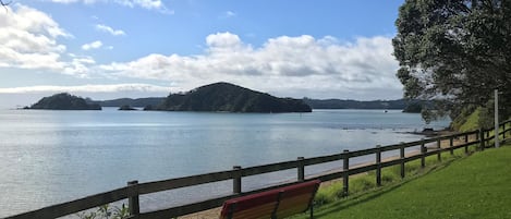 Beach nearby, white sand, beach towels