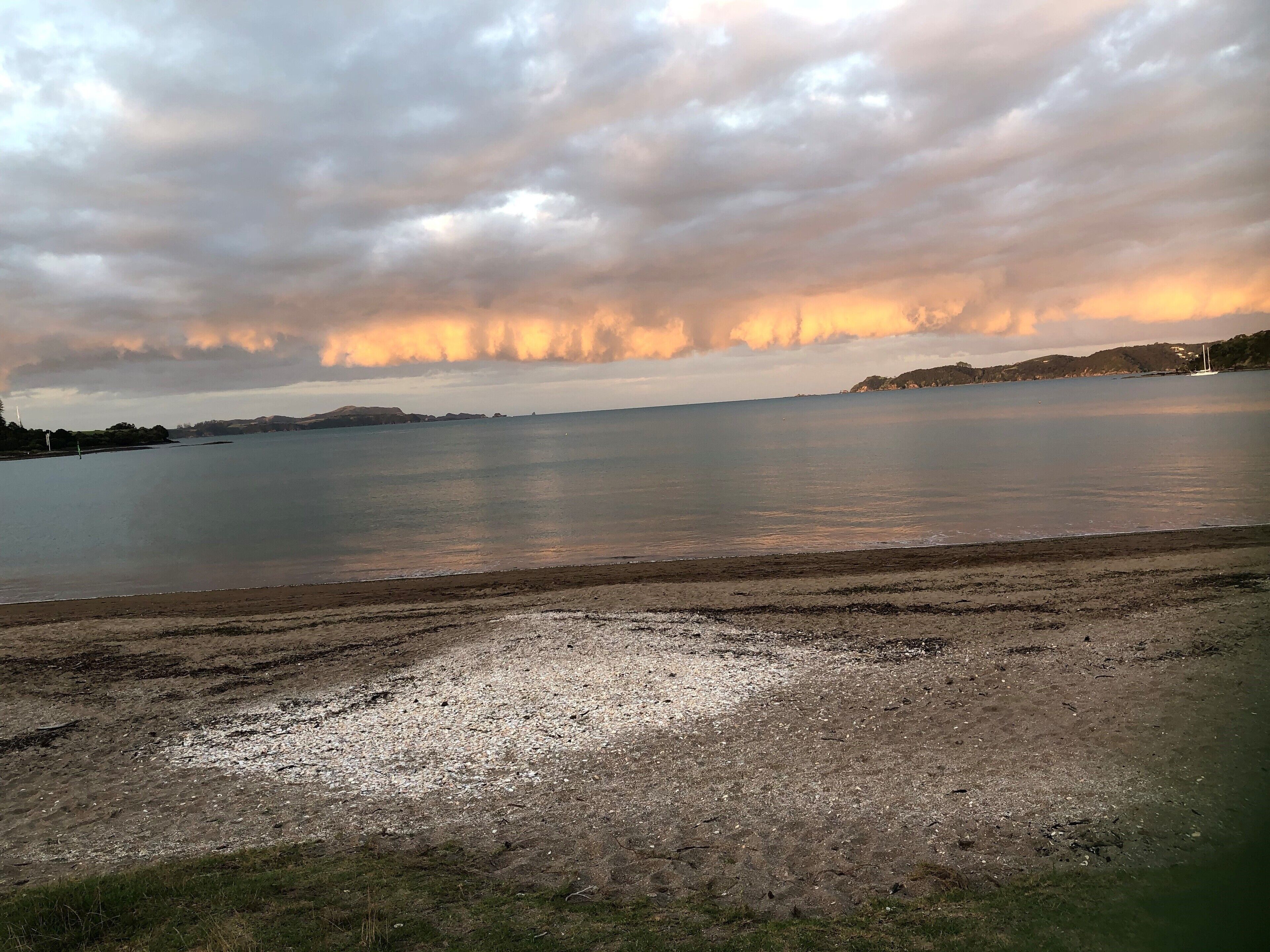 Beach nearby, white sand, beach towels