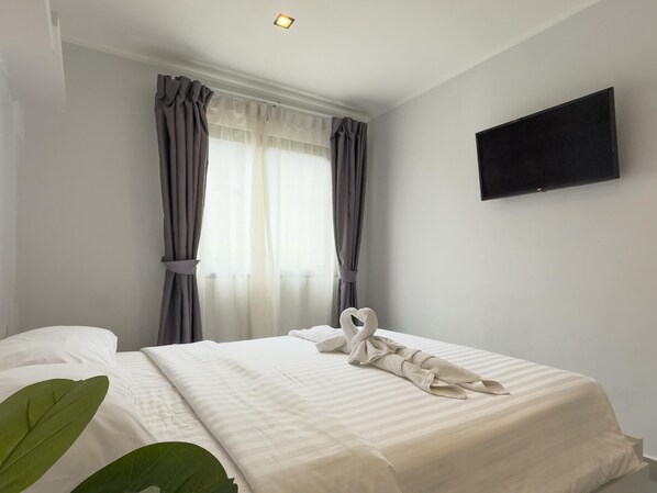 Comfort Apartment, Balcony, Garden View | In-room safe, desk, iron/ironing board, free WiFi